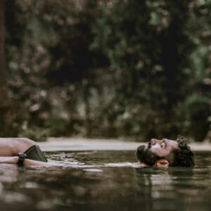 Luxury swimming pool at Morickap Resort in Wayanad surrounded by lush greenery and serene hill views
