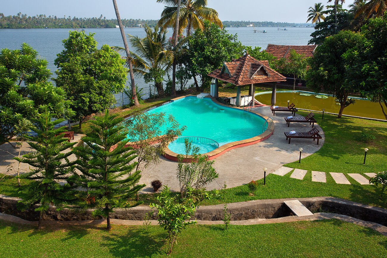 Refreshing swimming pool at Akanta Ayurveda Resort in Kerala helping guests relax after Ayurvedic treatments