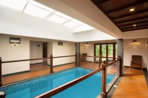 Private pool villa at Heaven Inn Munnar with spacious interiors, modern design, and scenic mountain views in Munnar.