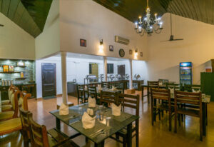  Restaurant at Warmth Lake Haven Alleppey serving traditional Kerala cuisine in a serene backwater setting