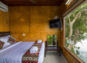 Tree house stay at Warmth Lake Haven Alleppey surrounded by lush greenery and backwater views