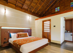 Luxurious rooms at Southern Panorama Indriya in Munnar featuring elegant interiors, spacious design, and scenic mountain views.